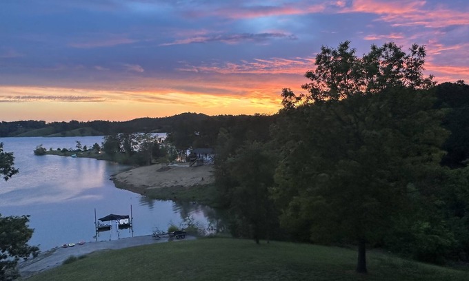 Sevierville Cabin | STAY HERE! NEW RENOVATIONS. Lake front home onsite boat launch and dock!