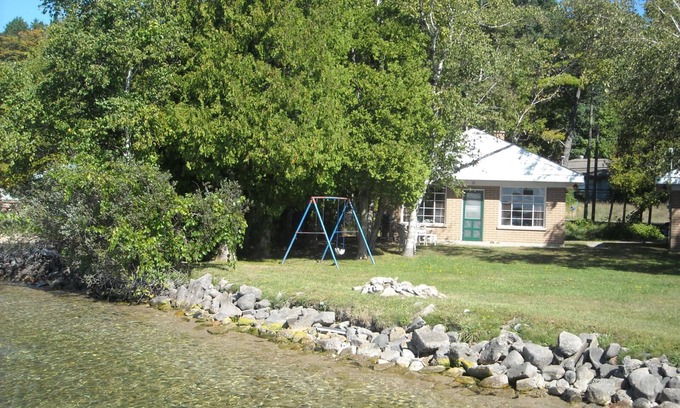 Lake Township Cottage | Stay on the water-Incredible Crystal Lake Lake Front Cottage!