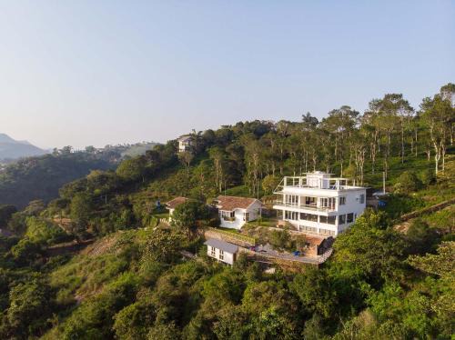 Elappara Villa | StayVista at Ozone Greens view of the unending Slopes and Valleys