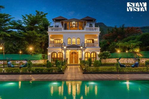 Karjat Villa | StayVista's Ashwamedha Manor - Mountain-Side Luxury Retreat with Outdoor Pool, Jacuzzi, Spa & Steam Room, and Indoor Activities