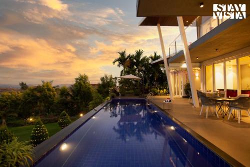 Nashik Villa | StayVista's Del Lago Farms - Lakeview Villa with Infinity Pool, Projector & Indoor-Outdoor Games