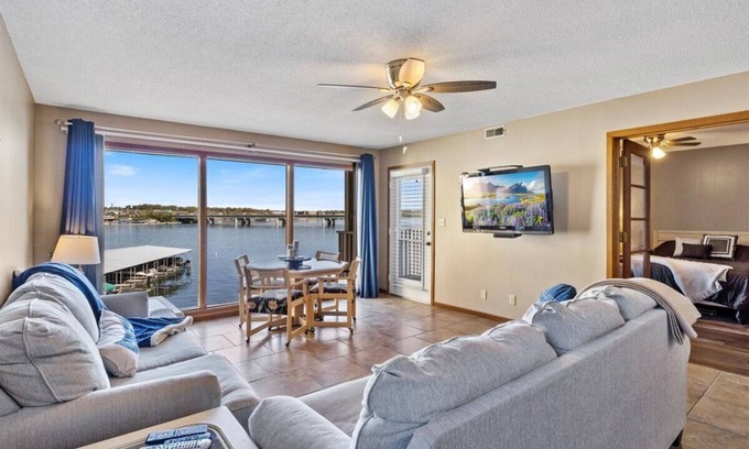 Osage Beach Condo | Steps from the pool! Sunset view for miles- lakefront pool