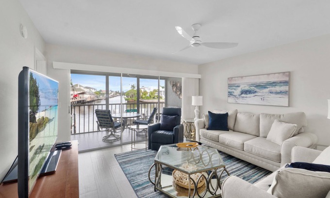 Vanderbilt Beach Condo | Steps to Vanderbilt Beach | Bright 2BR + Den with Bay Views