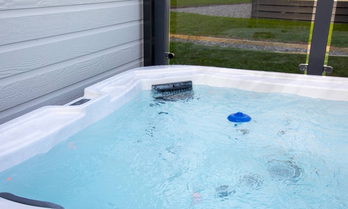 St. Andrews Cottage | Stewart Resort Lodge 50 - a lodge that sleeps 6 guests in 3 bedrooms