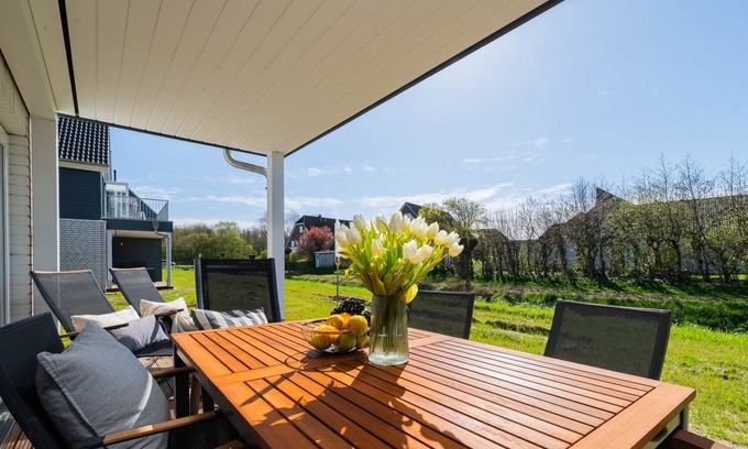 Busum Apartment | Stilvolle Ferienwohnung mit Sauna, Kamin, Terrasse und Wassernähe