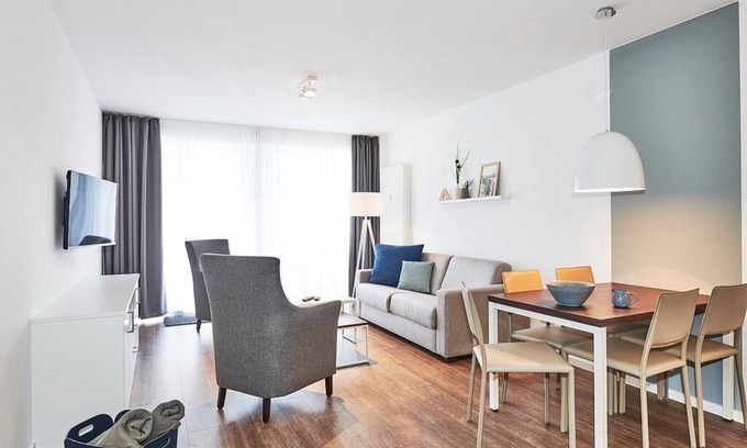 Bensersiel Apartment | Strandnahes, Modernes Apartment mit Westbalkon Inkl. Schwimmbad- & Saunanutzung