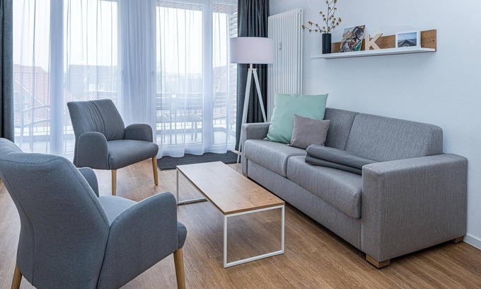 Bensersiel Apartment | Strandnahes Ferienapartment mit Balkon, Parkplatz, Schwimmbad- & Saunanutzung