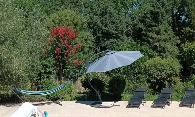 Saint-Amand-de-Vergt Apartment | Studio Apartment 'Grand Gîte Croix Du Sud' with Shared Pool, Shared Terrace and Wi-Fi