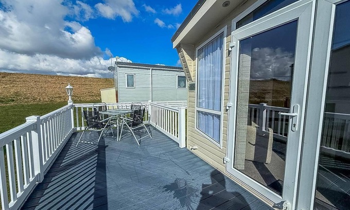 Walton on the Naze House | Stunning 6 berth caravan with decking at Naze Marine Holiday Park ref 17365BR