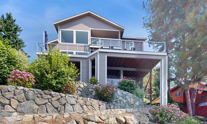 Willow Point House | Stunning home on the water with large deck, private dock, firepit