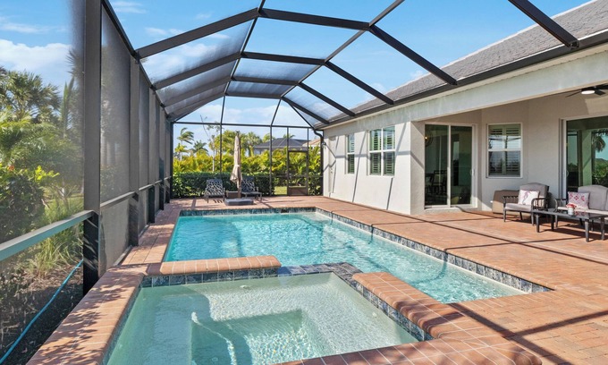South Gulf Cove House | Stunning Home with in ground pool, hot tub and dock in Port Charlotte, Florida!