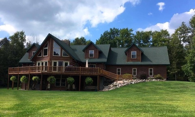 Homerville Cabin | Stunning Log Cabin on 65 Acres with a new swimming pool