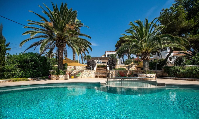 Punta Prima Villa | Stunning modern villa, with big pool and sea views, two minutes from the beach