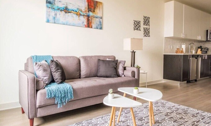 Downtown Louisville Apartment | Stunning Nulu 1BR CozySuites 01