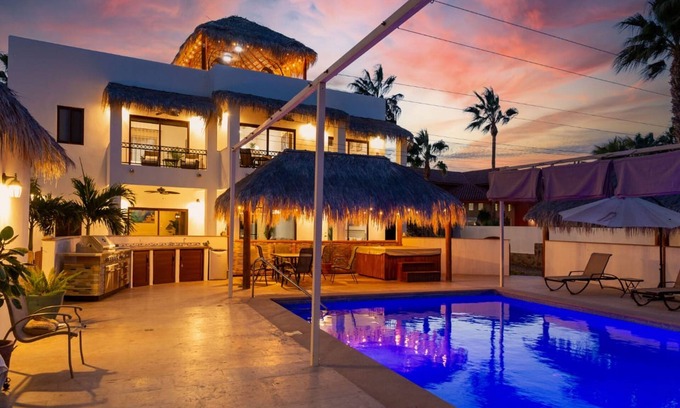 Loreto Villa | Stunning Villa with a highlight rooftop area, heated pool, balcony, & WIFI