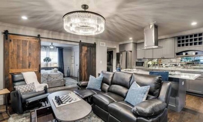 Peak's Suburban Addition Condo | Stylish 1BR furnished condo in Central Dallas with high-end kitchen, Nespresso coffee, 65” smart TV, king bed with premium mattress, and award-winning courtyard retreat.