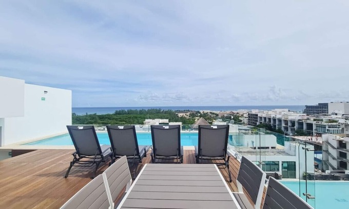 Luis Donaldo Colosio Apartment | Stylish 1BR | Private Balcony + Rooftop with Sea View