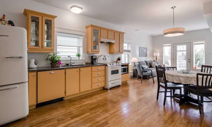 North End House | Stylish, dog friendly 2 bdrm main floor in duplex w fenced yard, onsite parking