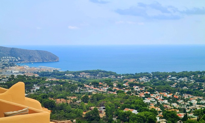 Benimeit Villa | Stylish Duplex in Moraira with Stunning Sea Views and Communal Pool.