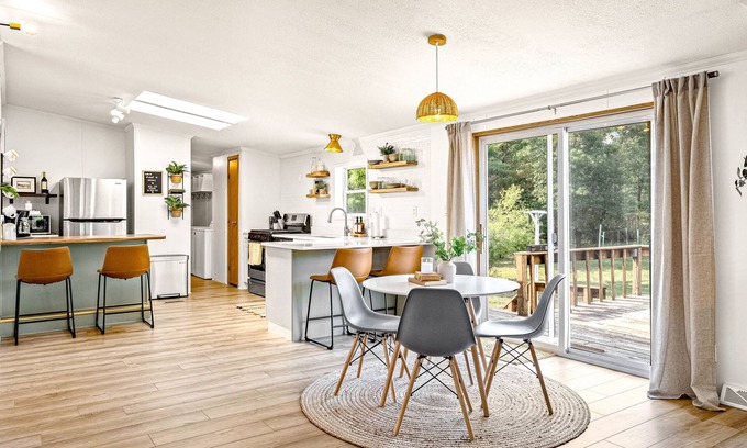 Arkdale House | Stylish, secluded retreat with large deck & nature views - near parks & golf
