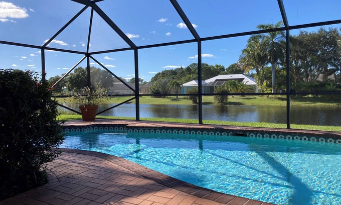 Port Saint Lucie House | Stylish Waterfront Home w/Heated Pool, 8 miles to the Beach, Close to Shopping.