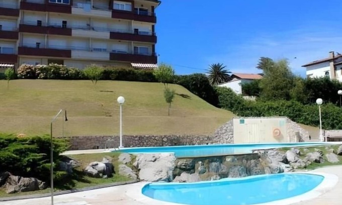 Suances Apartment | Suances con garaje privado, piscina , pie de playa