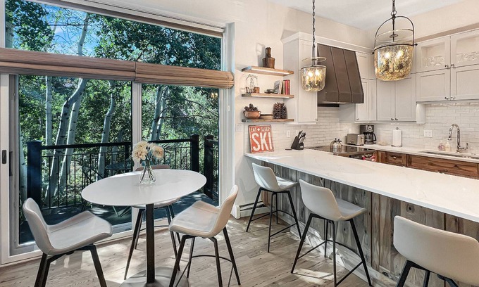 Snowmass Village Condo | Summer in Snowmass! Bright Corner Condo w/Views, 2 Balconies, Pool/HT, Parking & Trail Access