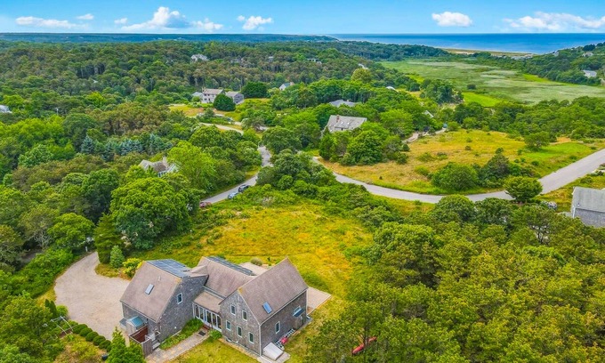 Truro House | Sun-filled escape with hot tub, deck, bikes, grill, W/D, & central AC