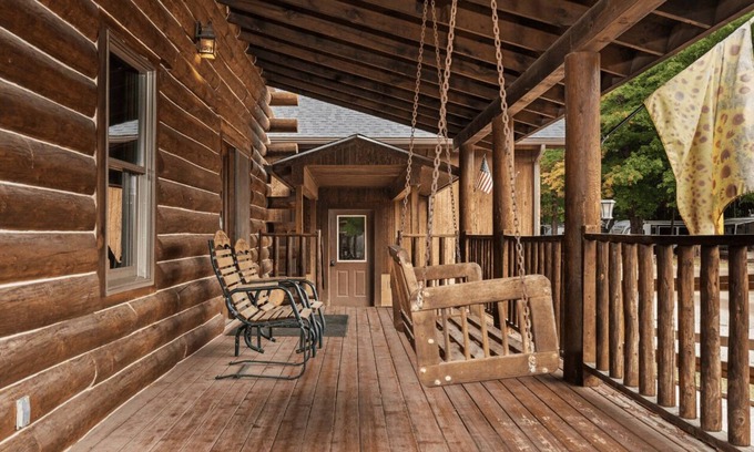 Benzonia Cabin | Sunflower Cabin - Pet Friendly - 2 Story Log Cabin sleeps 10 people in close proximity to amenities