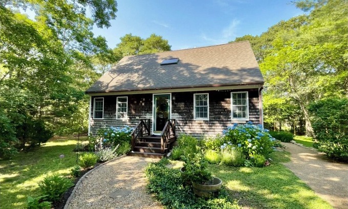 Lagoon Heights House | Sunny 3 bedroom cape with large deck, porch and kayaks. Pet friendly.