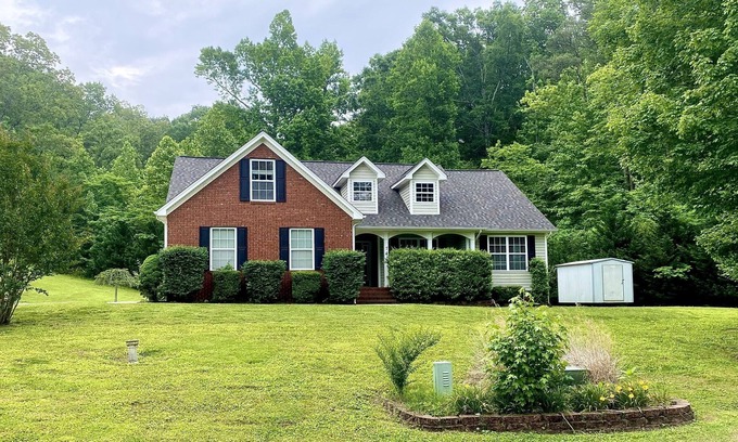 Flintstone House | Sunny Flintstone Haven with large deck, pool, hot tub, and game room!