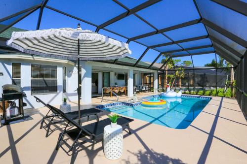 Naples House | Sunny Naples 3BR Retreat with Solar Heated Pool and BBQ