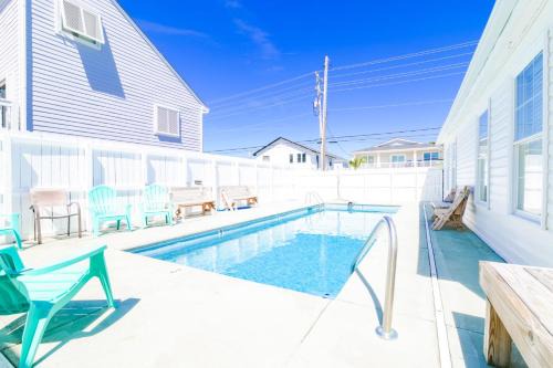 Cherry Grove Beach House | Suns Out Steps to Beach w Private Pool in Cherry Grove