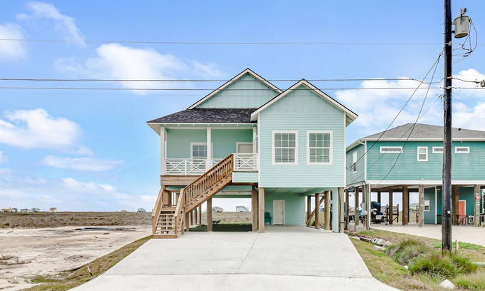 Rockport House | Sunset-view getaway with a wrap-around balcony, firepit, central AC, & W/D