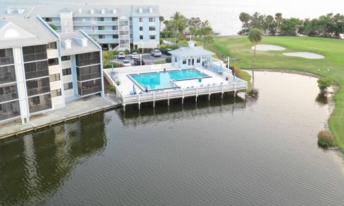 Stuart Condo | Sunshine & Palm Trees Overlooking The Water- Walk To The Beach!