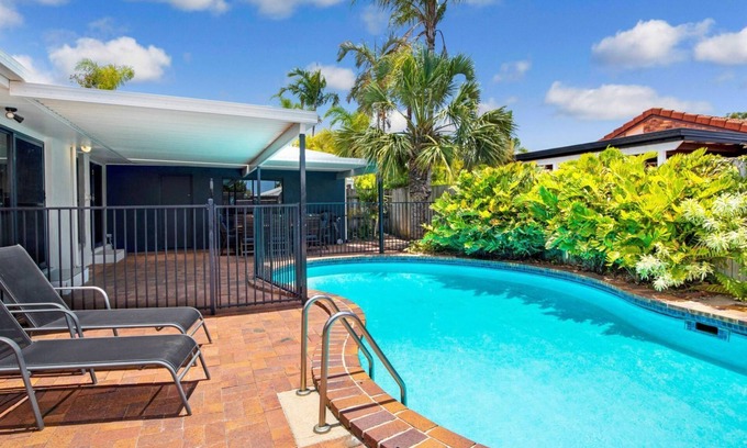 Rainbow Beach House | Sunyata Beach House - Rainbow Beach. Beachside escape with a pool, pet friendly and Wi-Fi!