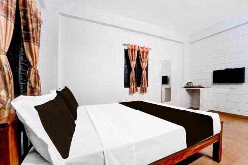 Coimbatore Hotel | Super Collection O Isha Yoga Center Coimbatore Formerly Nischala Stay