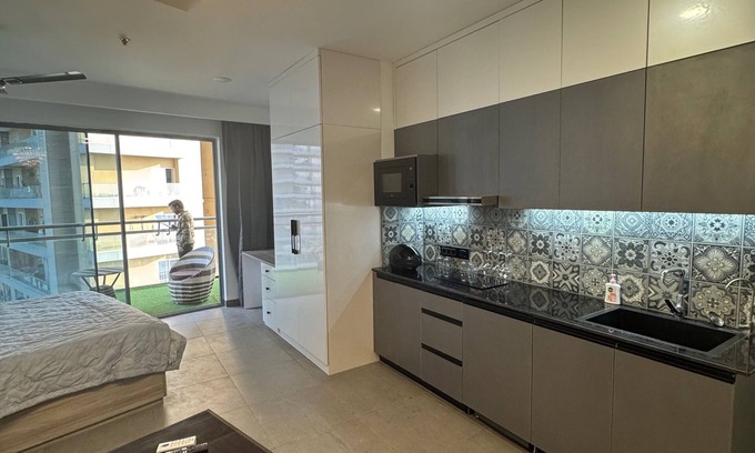 Noida Apartment | SUPERNOVA RETREATS Cozy 1-bedroom apartment with AC, WiFi in nice Noida