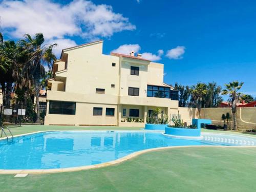 Parque Holandes House | Surf & Chill Bungalow 69, quiet green oasis with community swimmingpool