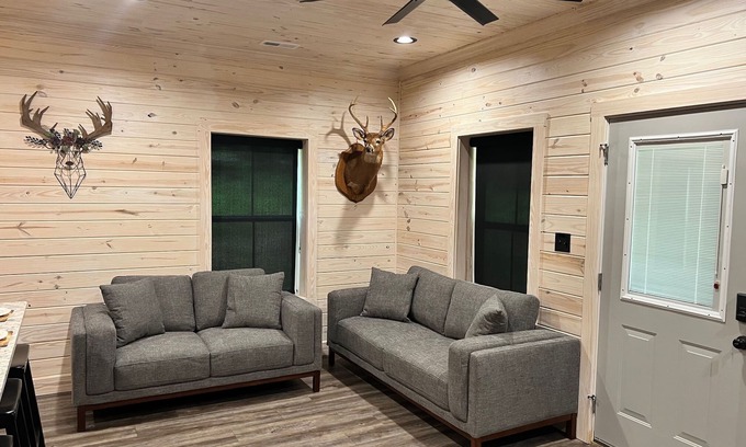 Grant Cabin | TAKE IT EASY Fishing Cabin. Large enclosed bay for storing the boat.