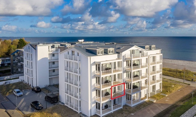 Grossenbrode Apartment | Tasteful apartment on the Baltic Sea with covered balcony and sauna in the house