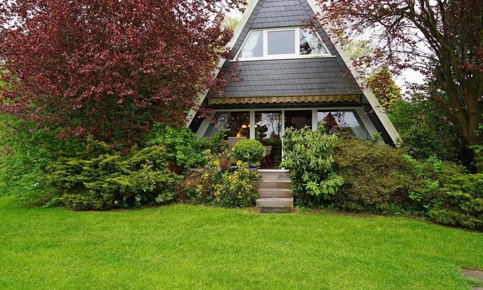Damp House | Tent roof house for the whole family - - with forest view and fiber optics