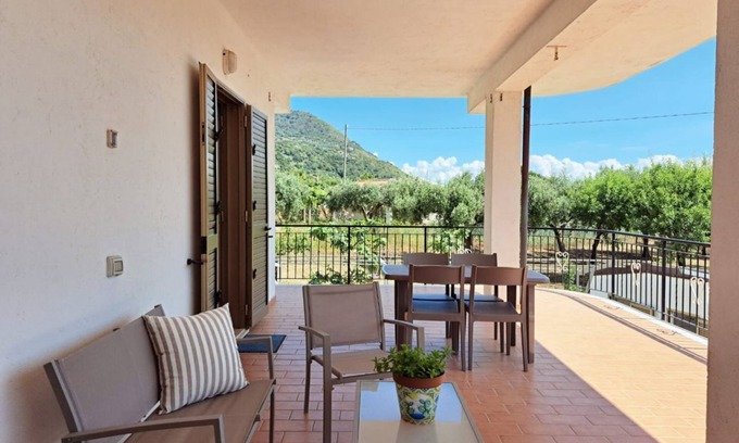 Santa Maria Apartment | Terrace among the olive trees in Ricadi (Riviera Apt. 4)
