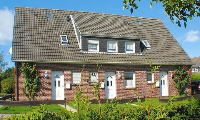 Westeraccumersiel House | Terraced house, Dornumersiel