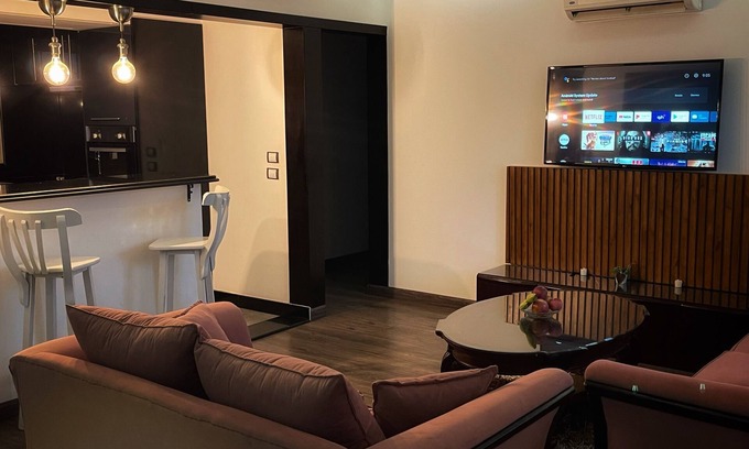 Nasr City Apartment | Terrific 2-bedroom apartment in New Cairo City with WiFi,AC & pvt patio garden