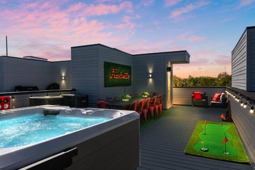 Katie Hill Neighborhood House | The Americana Abode Rooftop Hot Tub Game Room