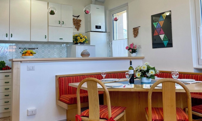 Verbania Apartment | The blackbird's nest: garden and private parking.