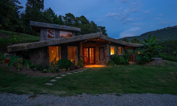 Wildwood Cottage | The Cavern on The Green. A unique hand-carved home. Quiet, great views