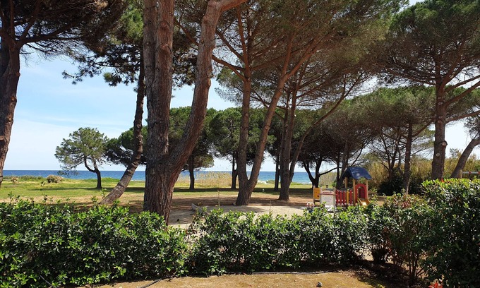 Poggio-Mezzana Apartment | The Costa verde with its feet in the water, garden and beachfront
