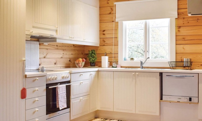 Mariannelund House | The cottage has an open floor plan and is located in the countryside.